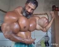 14093920-11072903-Valdir_Segato_in_his_early_50s_uses_oil_injections_which_make_hi-a-20_165944...jpg