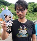 hideo-kojima-holding-a-pekora-plushie-v0-re14s949lbsc1.jpeg